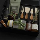 Luxury wine and cheese gift box featuring handcrafted Canadian products and festive touches.