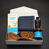 The Chalet Breakfast holiday gift box by Muse Baskets and Co. with pancake mix, maple syrup and blueberry jam in a pearl white box.