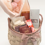In Her Bloom gift basket featuring Rogers' Chocolates milk chocolate squares and Laura Slack artisan chocolate bar wrapped in Japanese Chiyogami paper by Muse Baskets and Co Vancouver