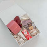 Luxury mothers day gift box with Vancouver Candle Co Amare candle Paume hand cream Laura Slack chocolate and Elosa bath bomb by Muse Baskets and Co