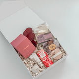 Luxury mothers day gift box with Vancouver Candle Co Amare candle Paume hand cream Laura Slack chocolate and Elosa bath bomb by Muse Baskets and Co