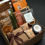 Cedar & Clove corporate holiday gift by Muse Baskets and Co. featuring SeaChange maple glazed salmon, Castello Brie and Parmesan & Garlic Crackers by Gone Crackers.