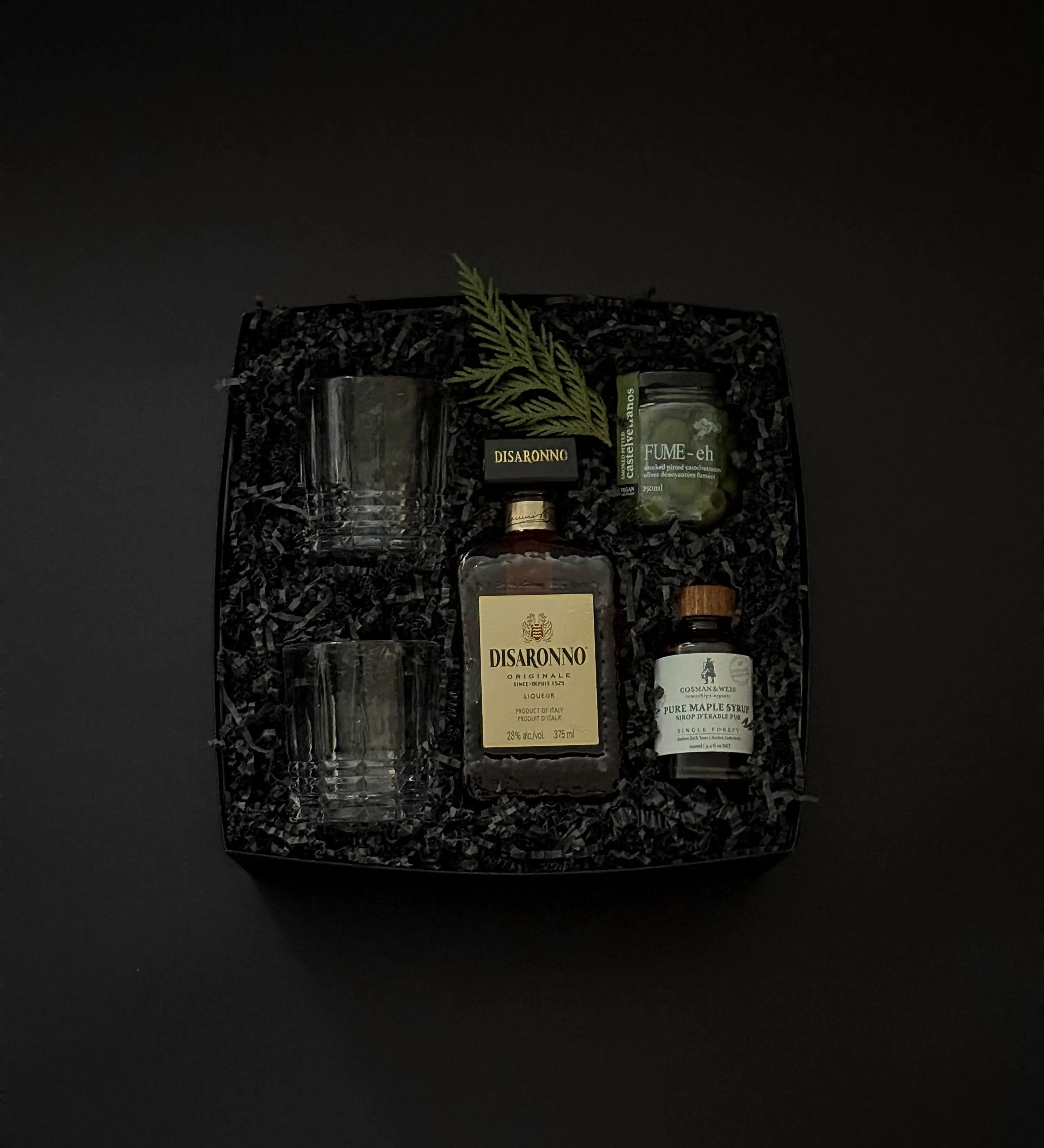 Old Fashioned Elegance cocktail gift box with Disaronno, maple syrup, olives, and crystal glasses.