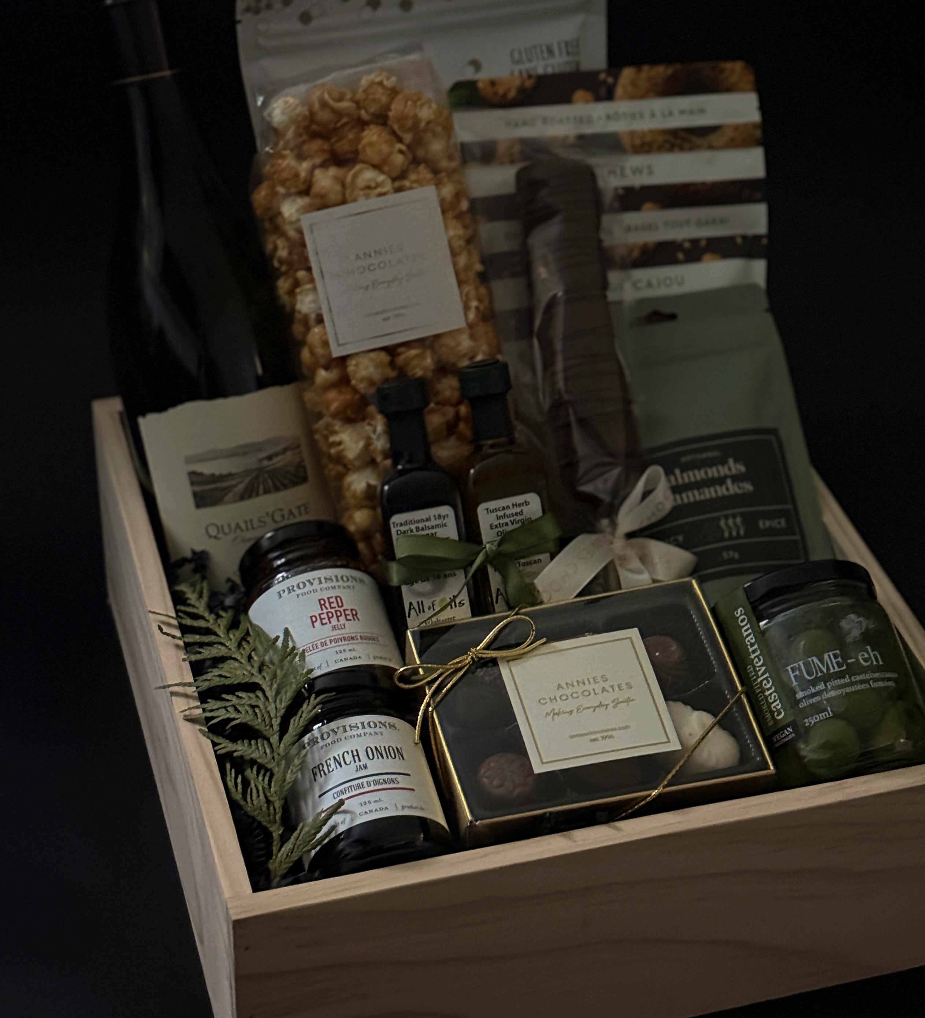Elegant wood gift box from Muse Baskets and Co. wrapped with grosgrain ribbon and a handwritten notecard — refined packaging detail of The Opulent Collection luxury gift box