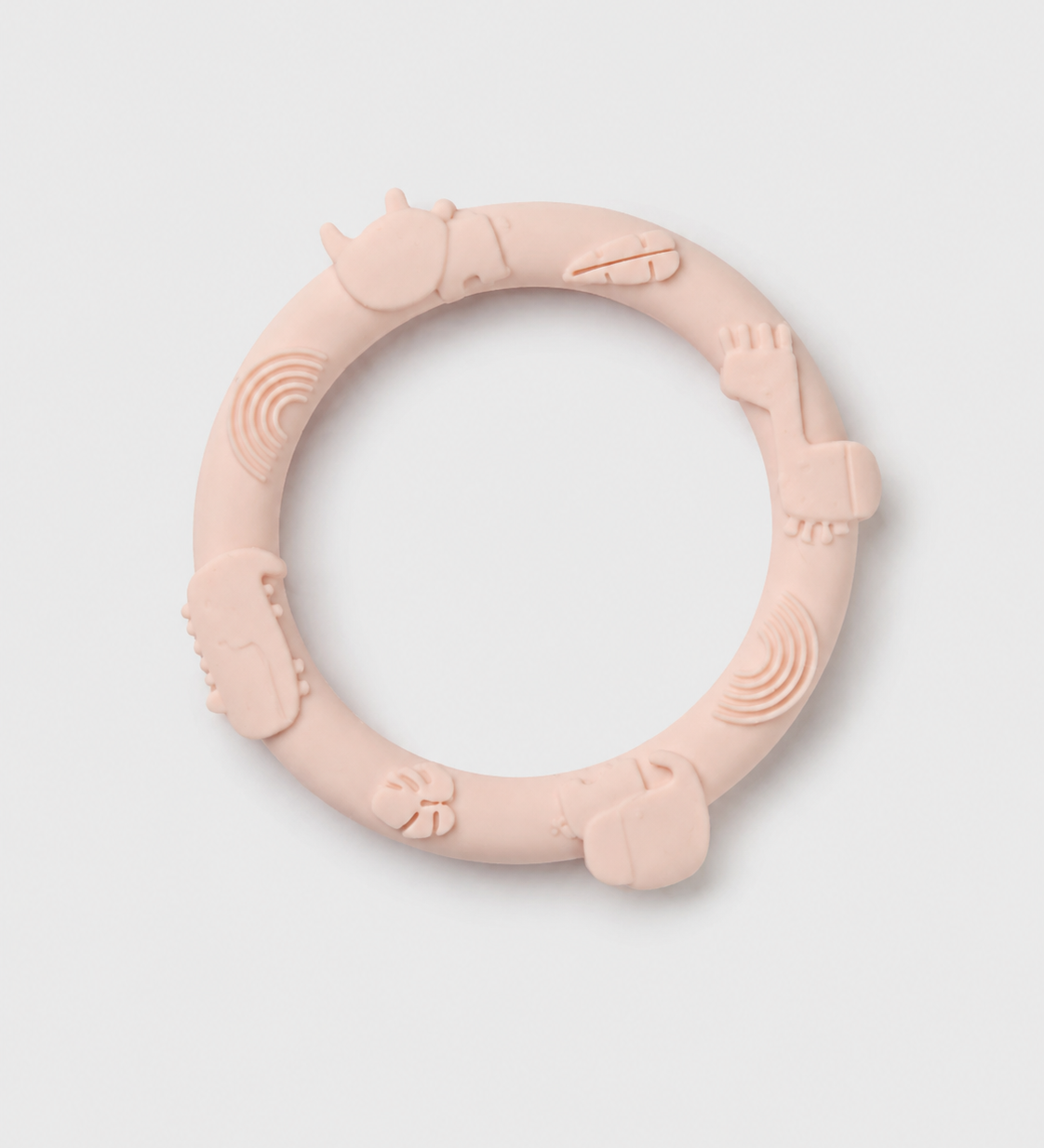 Pink silicone teething ring on a light gray background