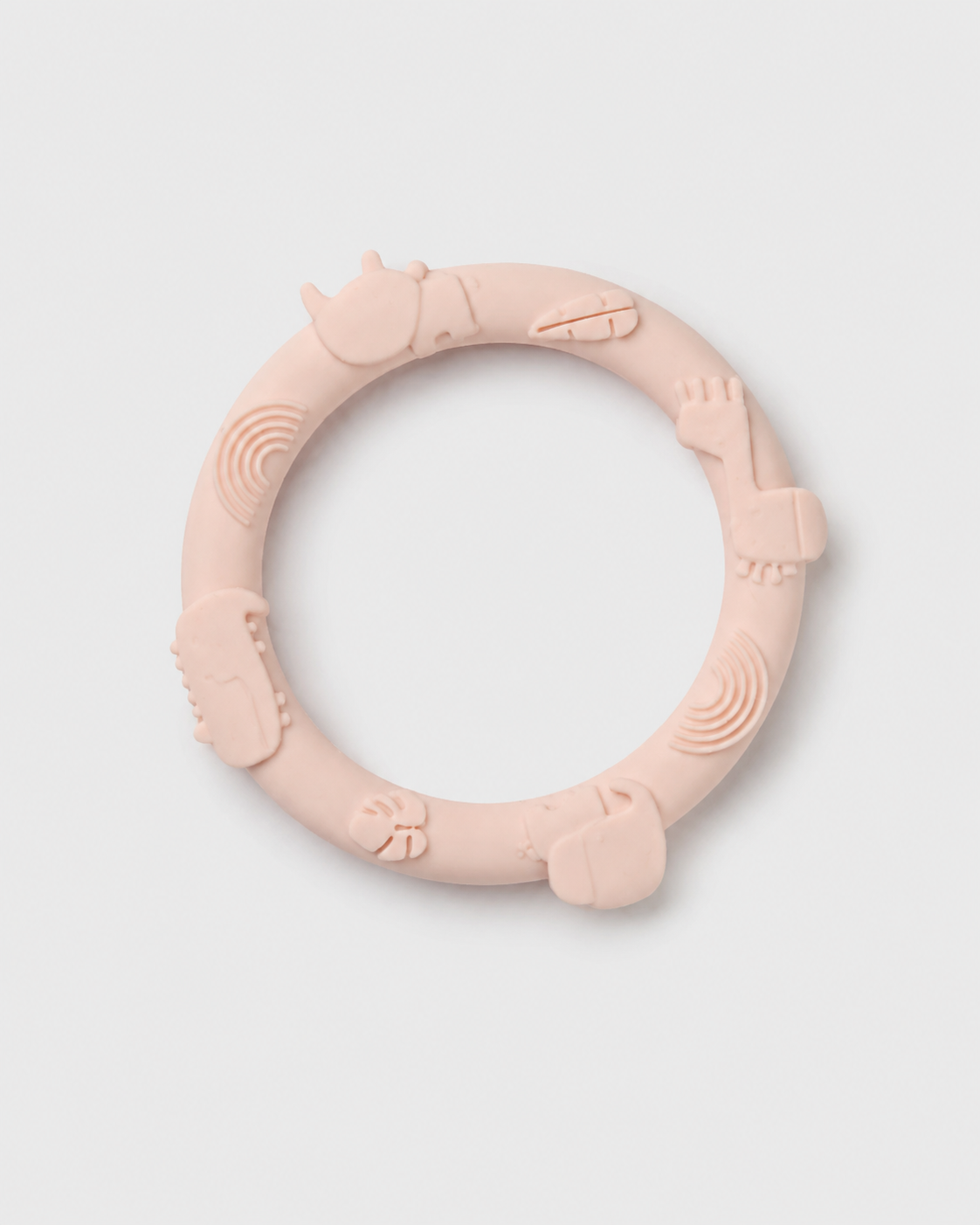 Pink silicone teething ring on a light gray background