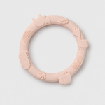 Pink silicone teething ring on a light gray background