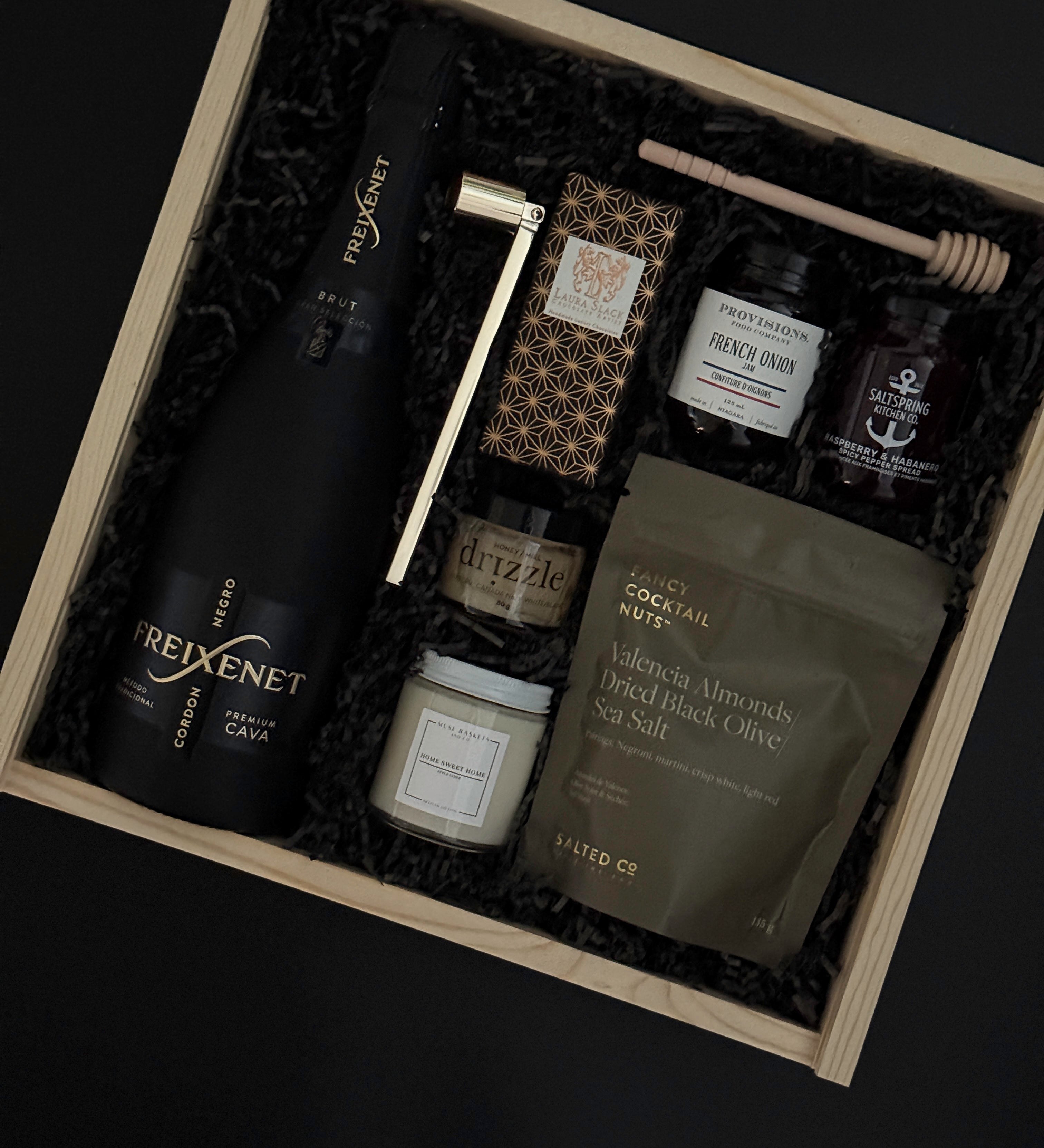 Realtor closing gift box featuring cava, spreads, chocolate, and candle.