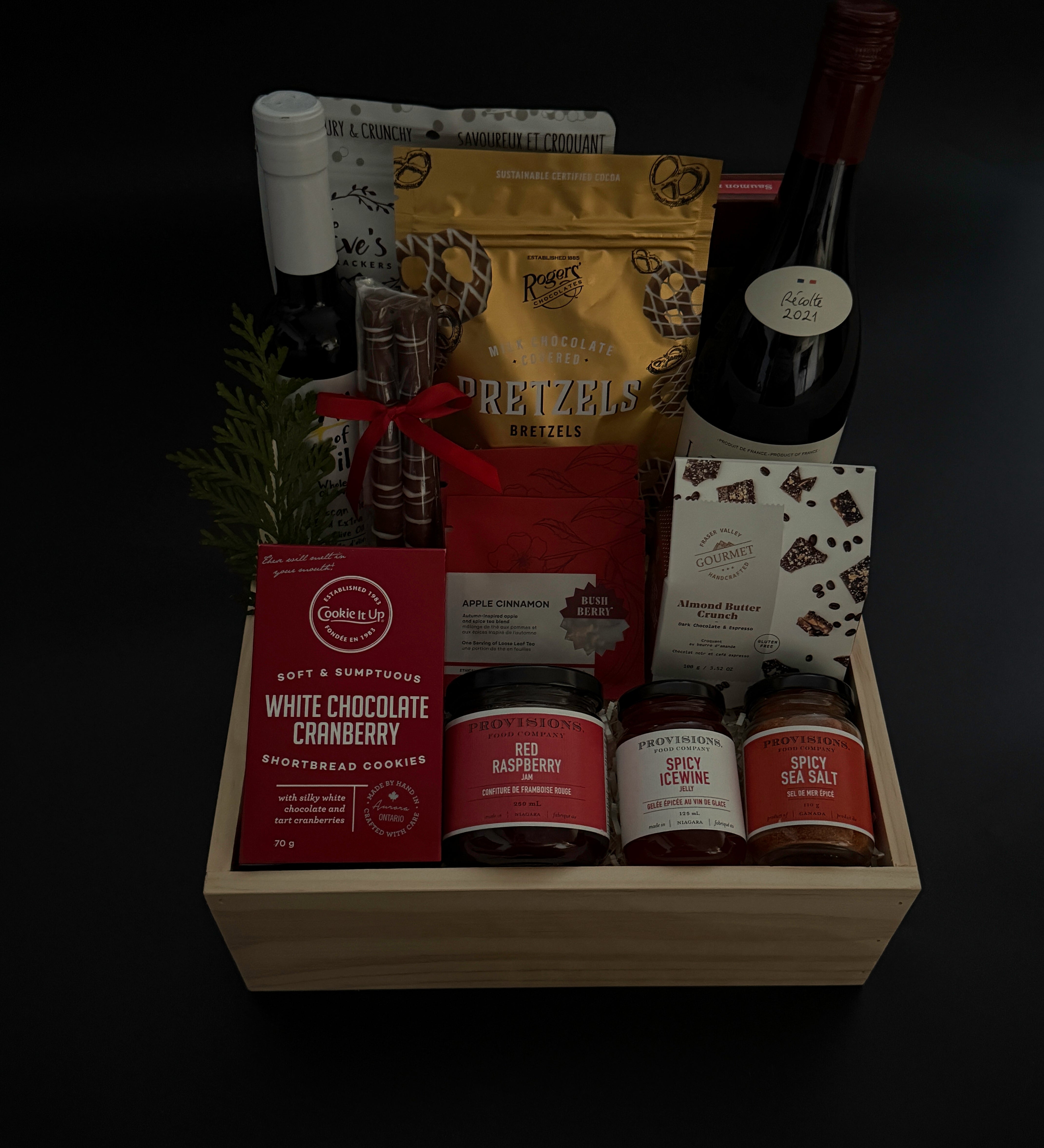 Luxury holiday gift box with French wine, savoury artisan foods, and gourmet confections.