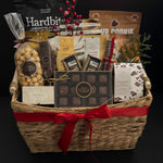 The Holiday Gathering holiday gift basket by Muse Baskets and Co. with artisan chocolates, crackers, gourmet popcorn and sweet and savoury Canadian provisions for corporate holiday gifting.