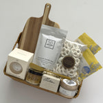 Woven Thanksgiving hostess gift basket by Muse Baskets and Co. with pantry, home and self-care items curated for hosts, clients and homeowners.