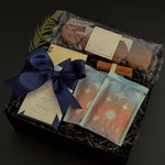 Luxury chocolate gift box featuring hot chocolate mixes, artisan chocolate, and cookies — perfect for corporate and holiday gifting.