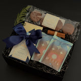 Luxury chocolate gift box featuring hot chocolate mixes, artisan chocolate, and cookies — perfect for corporate and holiday gifting.