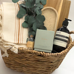 Demeure luxury gift box by Muse Baskets and Co. Vancouver with Vita candle Aesop Reverence hand wash and cream striped Turkish throw
