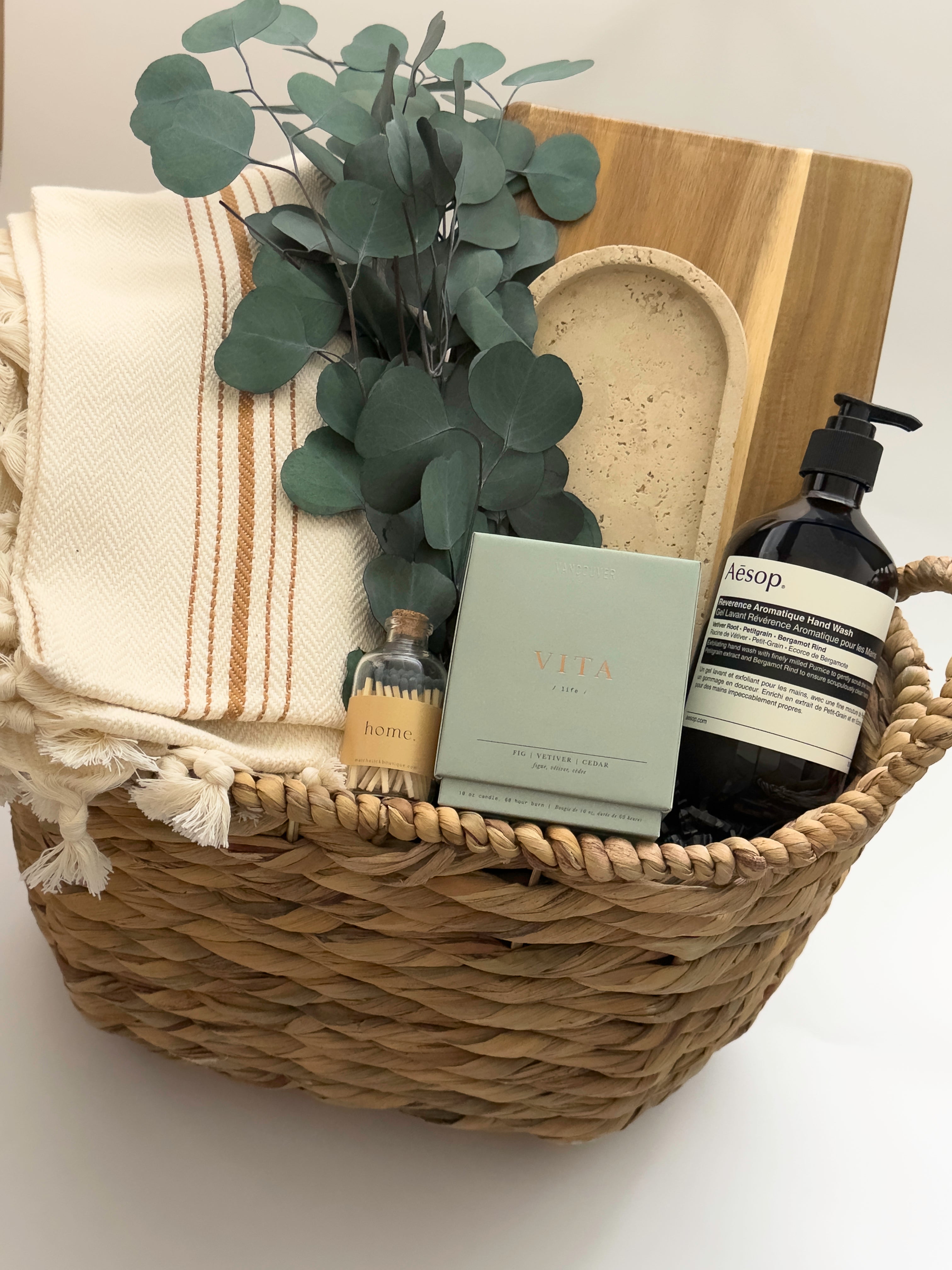 Demeure luxury gift box by Muse Baskets and Co. Vancouver with Vita candle Aesop Reverence hand wash and cream striped Turkish throw
