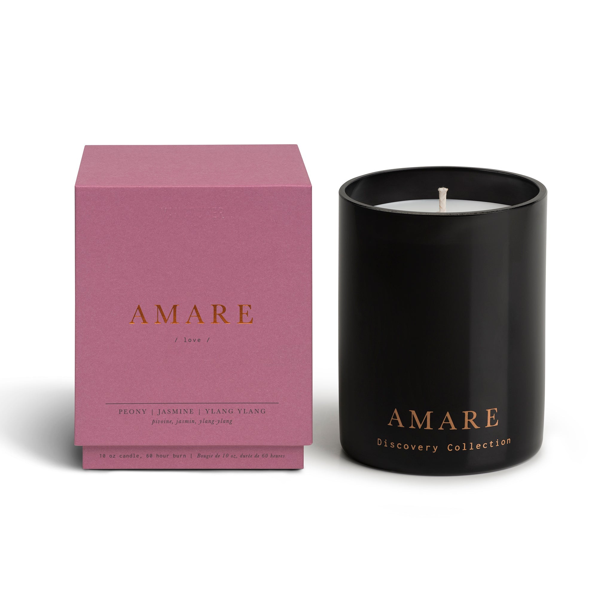 Vancouver Candle Co. Amare candle in peony, jasmine, and ylang ylang, shown beside its pink packaging, a premium candle featured in Muse Baskets and Co. corporate gift baskets