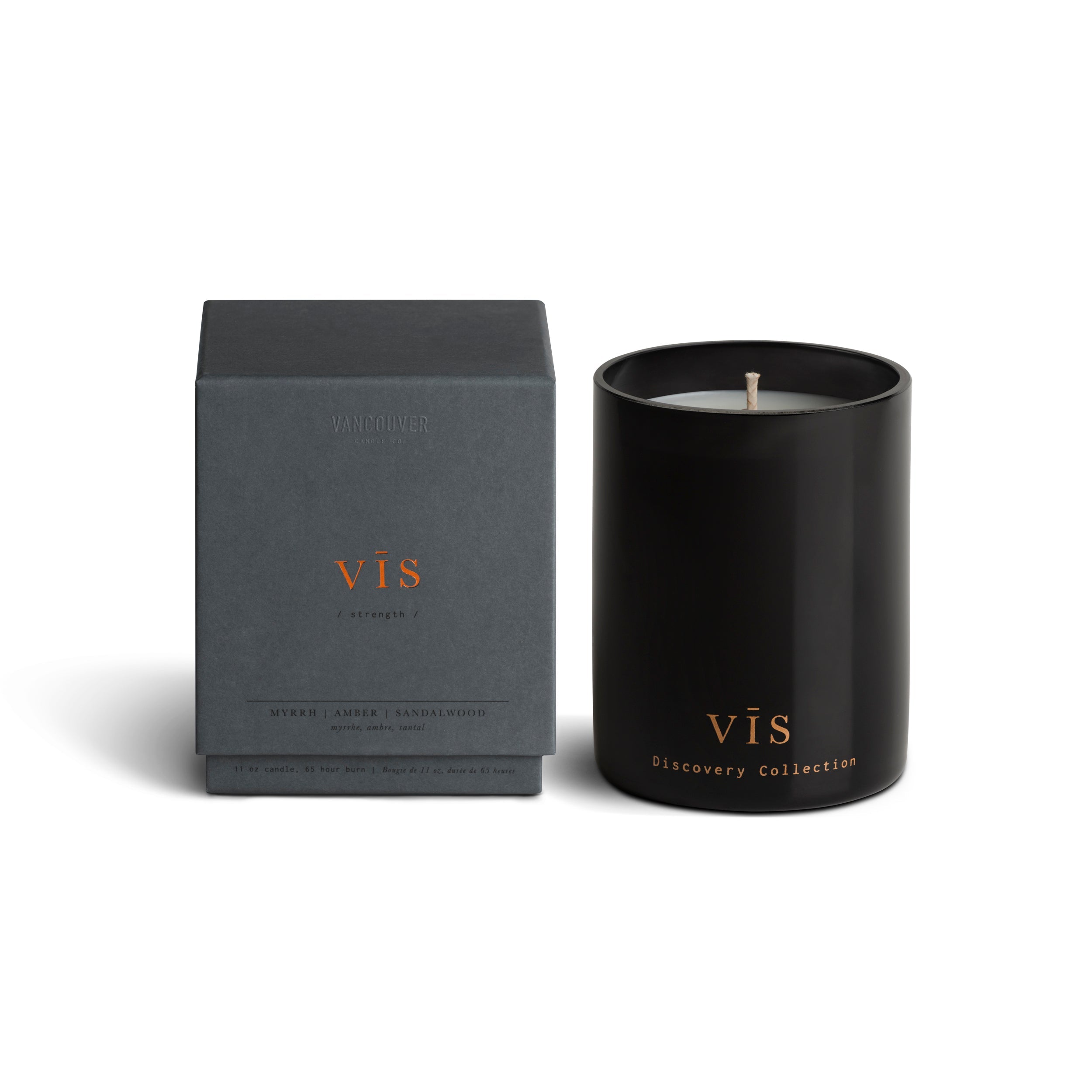 Vancouver Candle Co. Vis candle in myrrh, amber, and sandalwood, shown beside its packaging, a premium candle featured in Muse Baskets and Co. corporate gift baskets