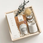 Warm Welcome realtor closing gift by Muse Baskets and Co. with Poet reed diffuser, Masala chai, gold tea steeper, soy candle and Fable mug in a Signature Luxe Wood Gift Box.