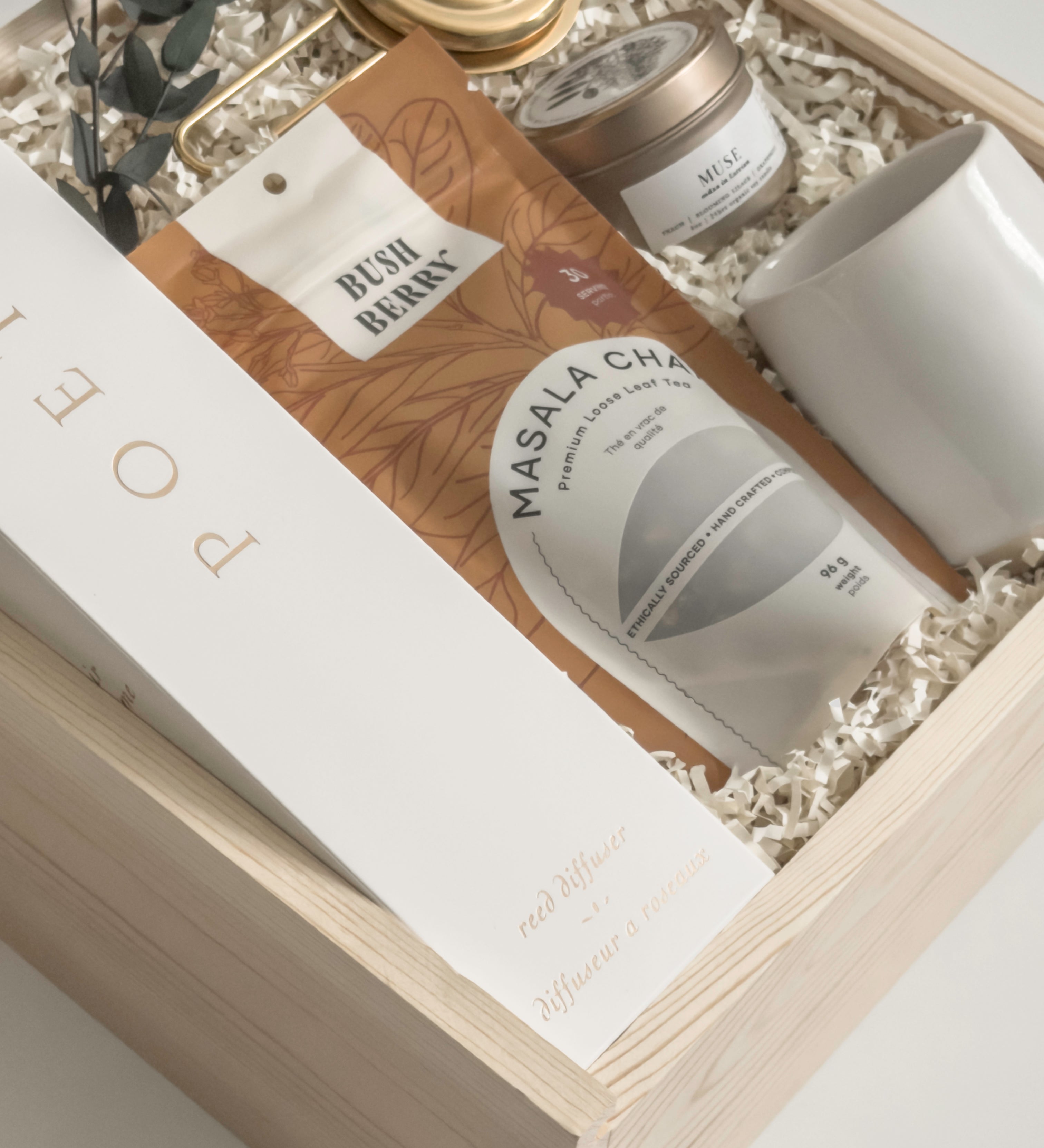 Luxury possession day gift featuring a Poet reed diffuser, pearl white Fable mug, Canadian masala chai and Muse soy candle, curated by Muse Baskets and Co.