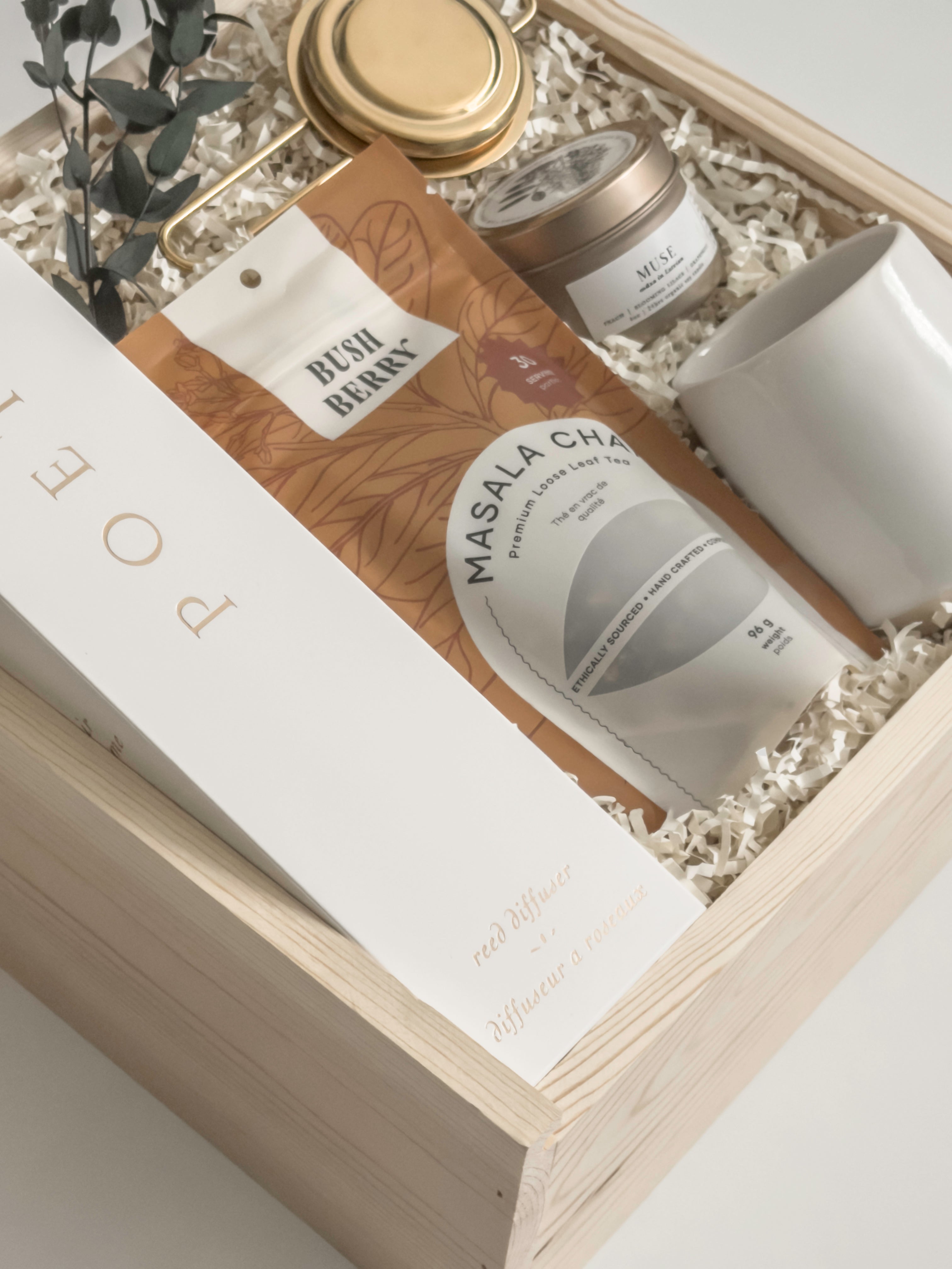 Luxury possession day gift featuring a Poet reed diffuser, pearl white Fable mug, Canadian masala chai and Muse soy candle, curated by Muse Baskets and Co.