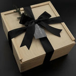 picture of a wood gift box with a satin ribbon