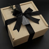 picture of a wood gift box with a satin ribbon